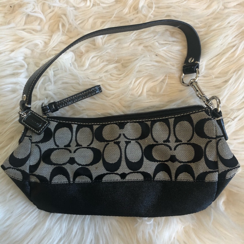 Coach Small Handbag with Signature Design